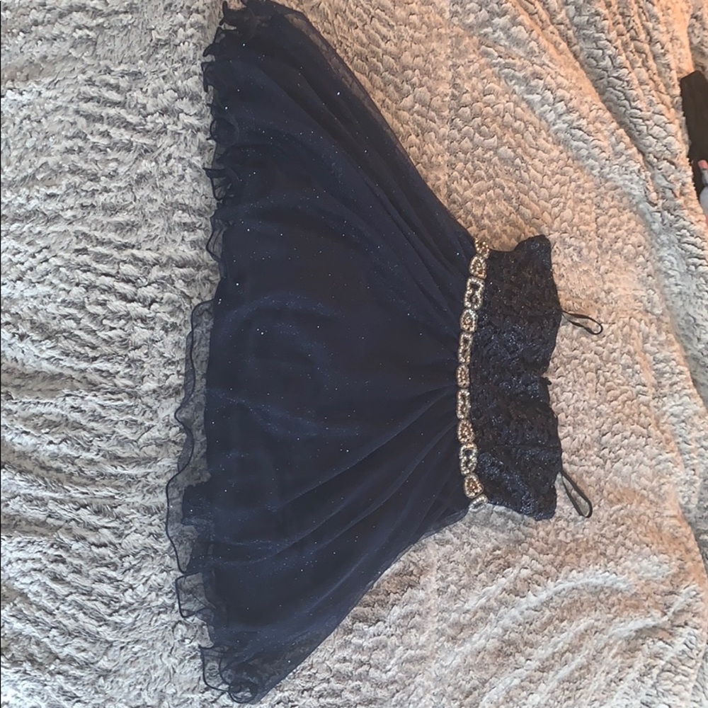 A sequin rhinestone navy blue dress.
